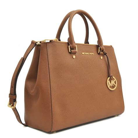 michael kors travel bag changable handles|Michael Kors bag.